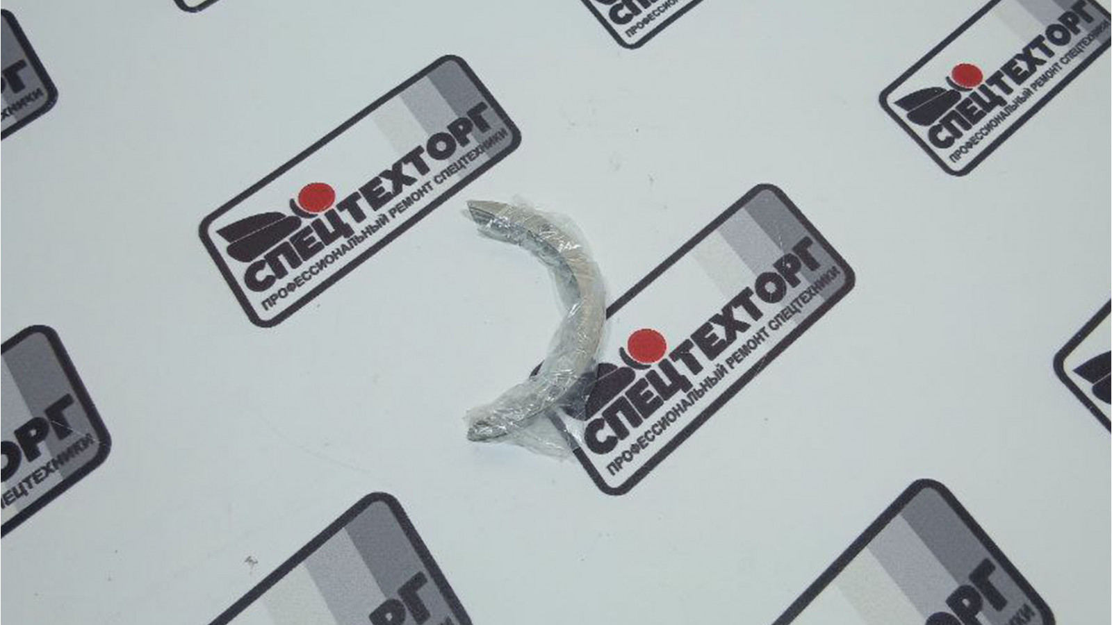 Упорное полукольцо коленвала Yuchai YC6108G 4110000560060 Упорное полукольцо коленвала Yuchai YC6108G 4110000560060